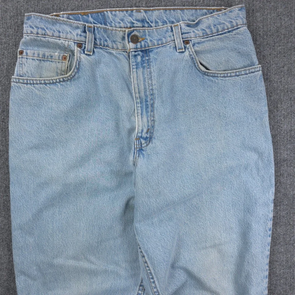 VINTAGE Levis 560 Loose Fit Tapered Leg Jeans Light Wash Blue Mens Denim 34x32